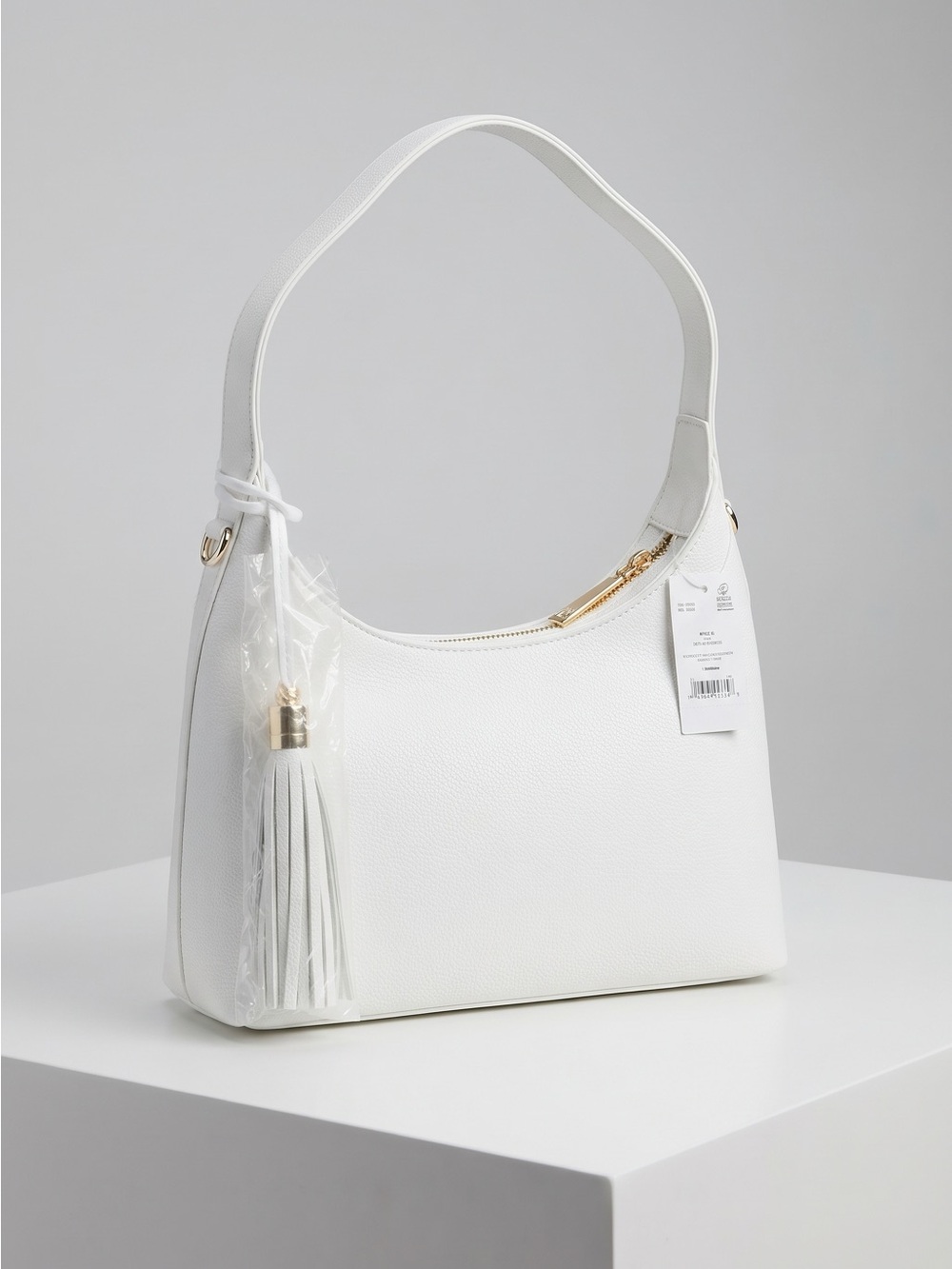 Call It Spring White Pebbled Shoulder Bag with Tassel Accent